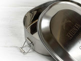 Ovale, geöffnete Brotzeitbox aus Metall